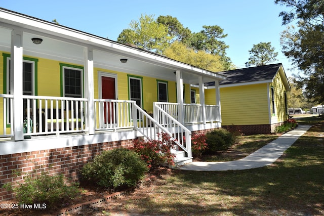 exterior space with crawl space and covered porch