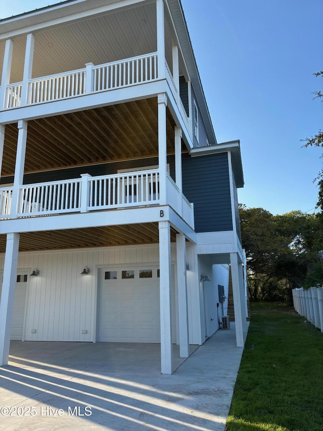 view of home's exterior featuring a yard and an attached garage