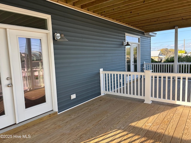 wooden deck featuring french doors