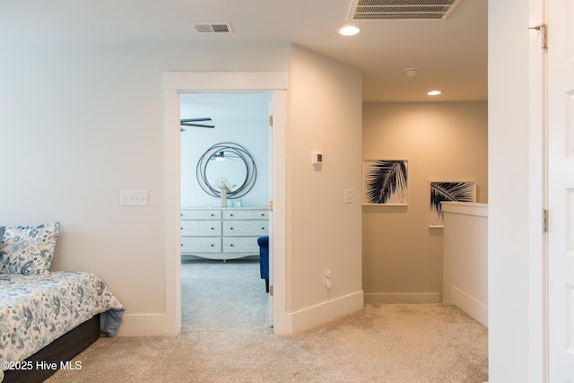 hallway featuring carpet flooring, recessed lighting, and baseboards