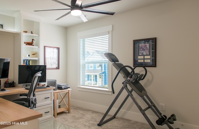 office with light colored carpet, ceiling fan, and baseboards