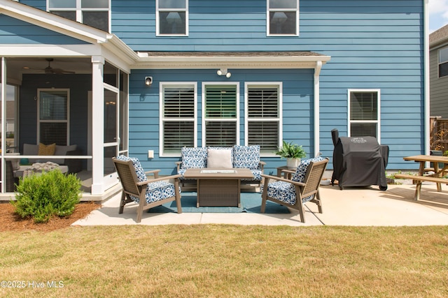 view of patio with outdoor lounge area and grilling area