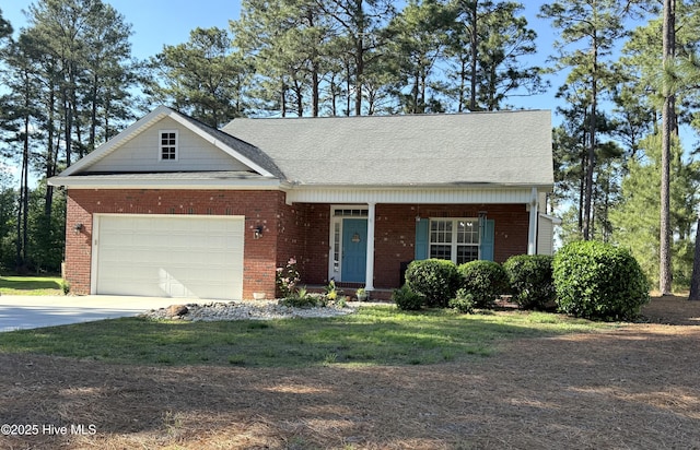 165 Laurel Oak Ln, Pinebluff, NC 28373 - view of front of property with brick siding, an attached garage, driveway, a porch, and a front yard