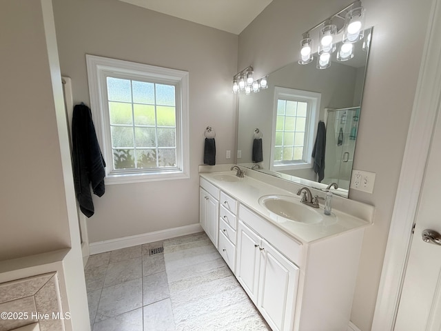 165 Laurel Oak Ln, Pinebluff, NC 28373 - full bath featuring a shower stall, baseboards, and double vanity