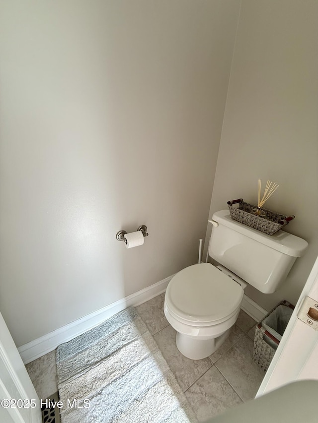 165 Laurel Oak Ln, Pinebluff, NC 28373 - bathroom with toilet, baseboards, and tile patterned floors
