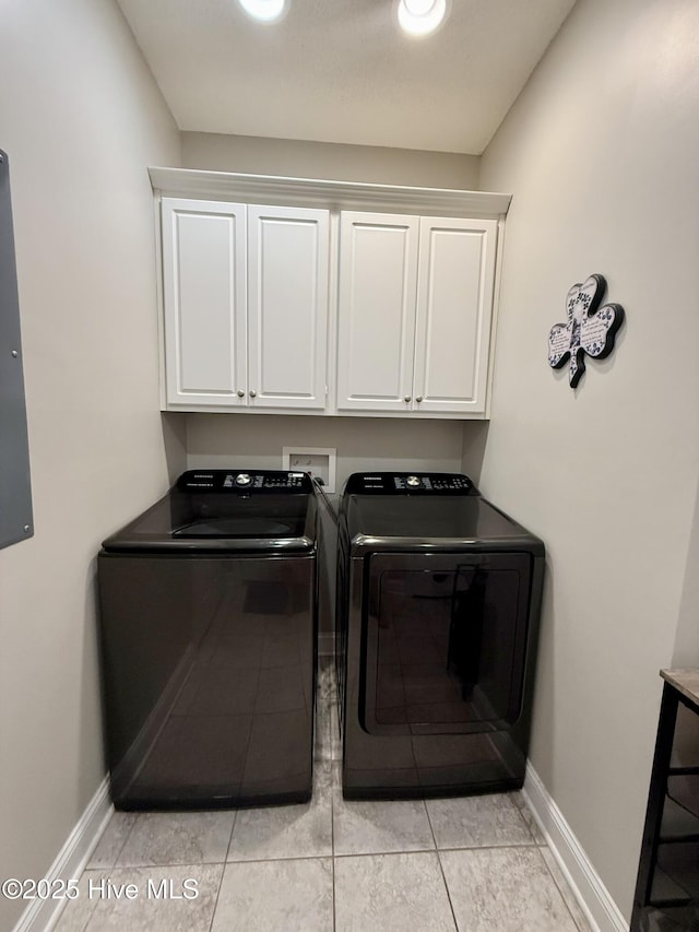 165 Laurel Oak Ln, Pinebluff, NC 28373 - laundry area featuring independent washer and dryer, cabinet space, and baseboards