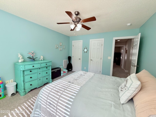 165 Laurel Oak Ln, Pinebluff, NC 28373 - carpeted bedroom with a ceiling fan and a textured ceiling