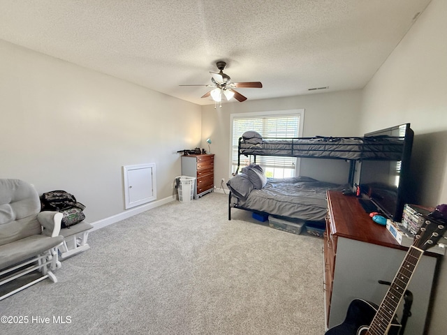 165 Laurel Oak Ln, Pinebluff, NC 28373 - carpeted bedroom with baseboards, a ceiling fan, and a textured ceiling