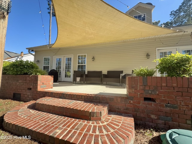 165 Laurel Oak Ln, Pinebluff, NC 28373 - rear view of house featuring a patio area and french doors
