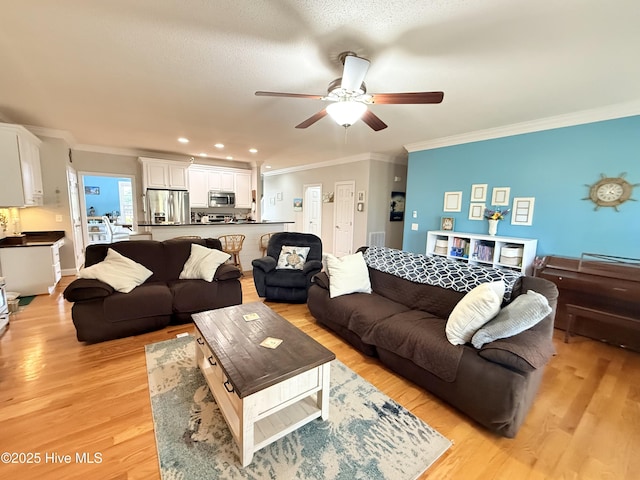 165 Laurel Oak Ln, Pinebluff, NC 28373 - living room featuring ornamental molding, ceiling fan, light wood-type flooring, and recessed lighting