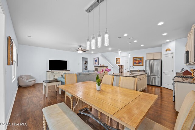 7351 Bellacroft Dr, Leland, NC 28451 - dining area with recessed lighting, dark wood finished floors, a ceiling fan, baseboards, and stairs