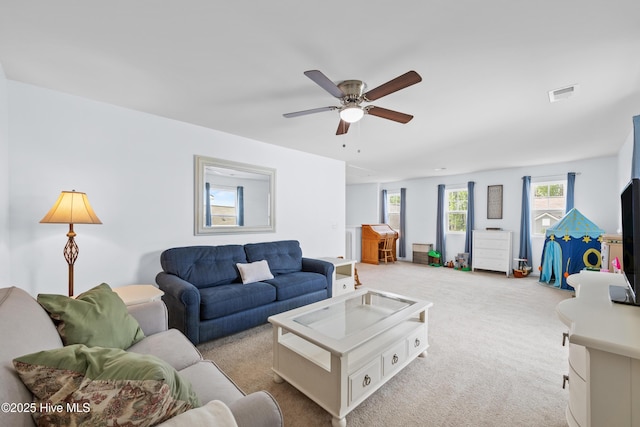 7351 Bellacroft Dr, Leland, NC 28451 - carpeted living room with ceiling fan