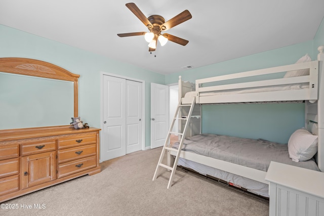 7351 Bellacroft Dr, Leland, NC 28451 - bedroom featuring light carpet, a closet, and ceiling fan
