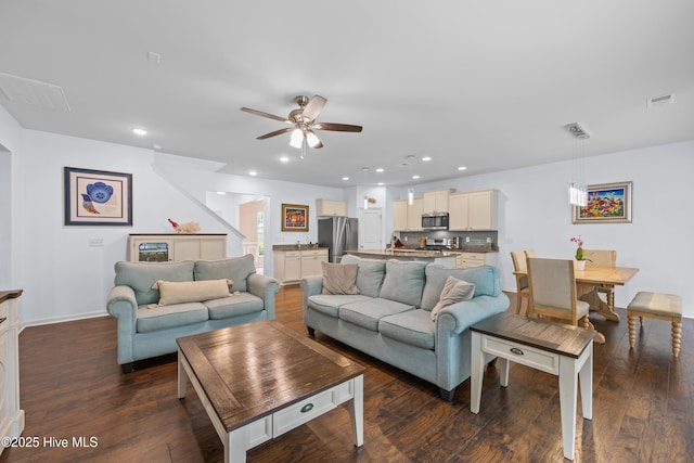 7351 Bellacroft Dr, Leland, NC 28451 - living room with a ceiling fan, dark wood finished floors, recessed lighting, and baseboards