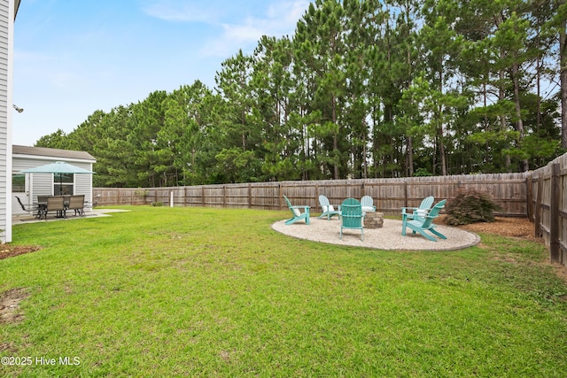 7351 Bellacroft Dr, Leland, NC 28451 - view of yard featuring a patio and a fire pit