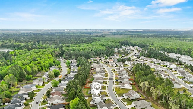 7351 Bellacroft Dr, Leland, NC 28451 - aerial view of residential area featuring a heavily wooded area