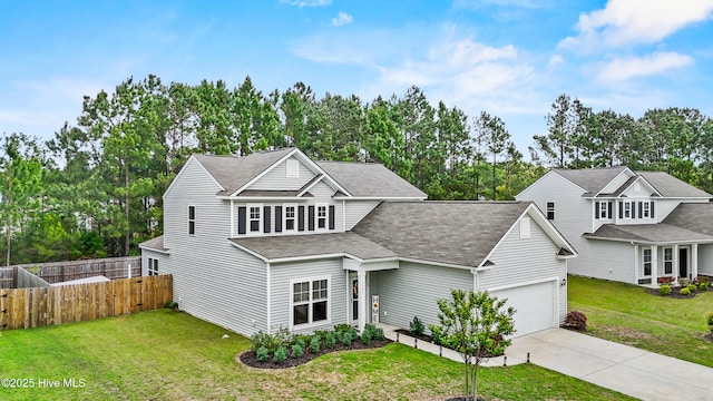 7351 Bellacroft Dr, Leland, NC 28451 - traditional home with a shingled roof, an attached garage, driveway, and view of wooded area