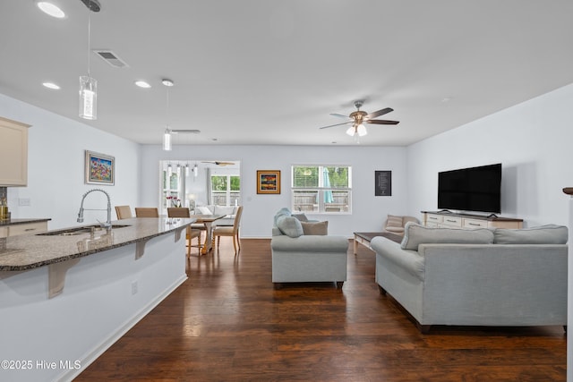 7351 Bellacroft Dr, Leland, NC 28451 - living room featuring a ceiling fan, dark wood-type flooring, and recessed lighting