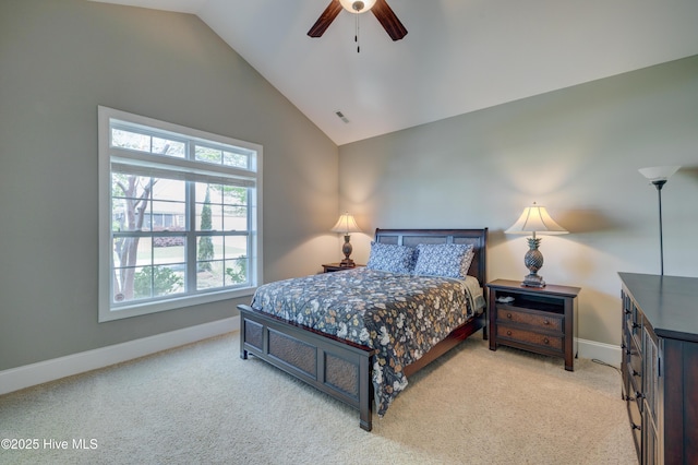 bedroom with light carpet, visible vents, baseboards, and vaulted ceiling