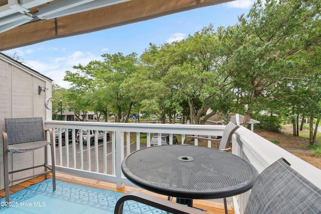 balcony featuring outdoor dining space