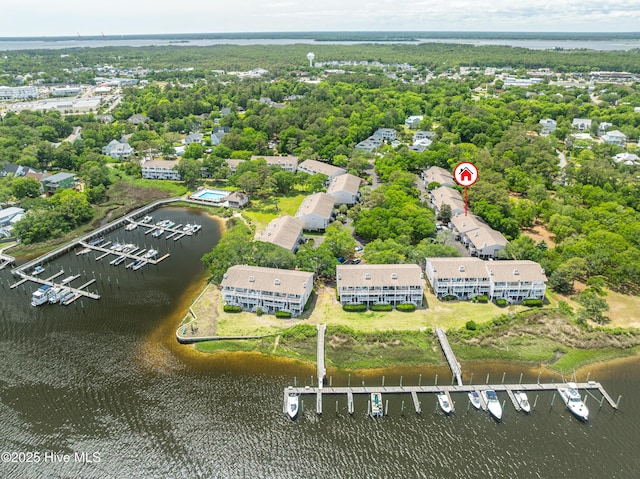 drone / aerial view of a large body of water and numerous boat docks