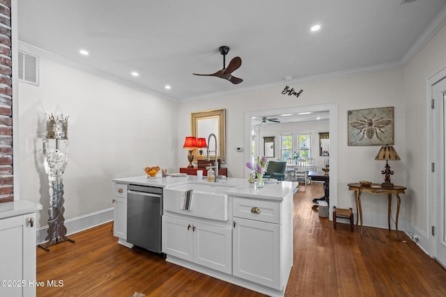 kitchen featuring ceiling fan, a sink, light countertops, stainless steel dishwasher, and visible vents