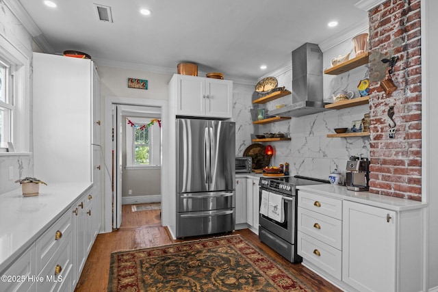 kitchen featuring appliances with stainless steel finishes, tasteful backsplash, open shelves, dark wood-style floors, and wall chimney exhaust hood