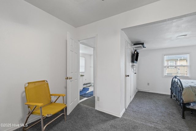 interior space featuring baseboards and carpet