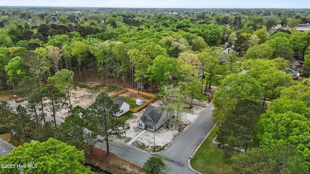 bird's eye view with a forest view