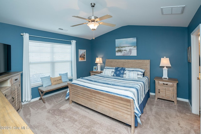 bedroom featuring visible vents, baseboards, carpet floors, and lofted ceiling