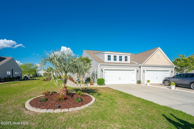 view of front facade featuring a front yard and driveway