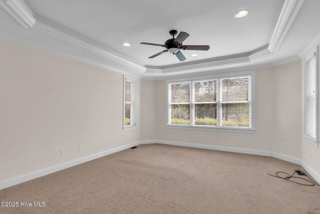3400 Canmorre Ct, Fayetteville, NC 28306 - empty room featuring a raised ceiling, baseboards, and ornamental molding