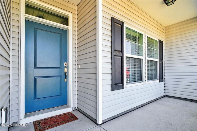 property entrance with a porch