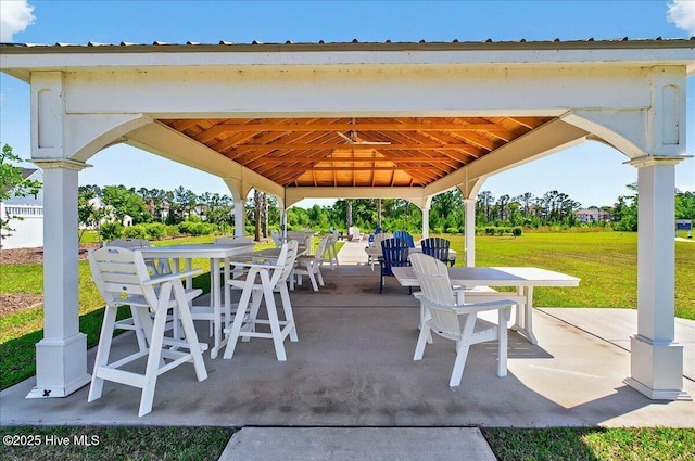 view of patio / terrace with a gazebo and outdoor dining area