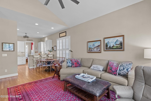 423 Black Diamond Dr, Wilmington, NC 28411 - living room with light wood-style floors, ceiling fan, vaulted ceiling, and recessed lighting