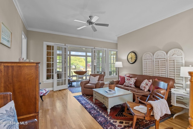 423 Black Diamond Dr, Wilmington, NC 28411 - living room featuring light wood-style flooring, crown molding, and a ceiling fan