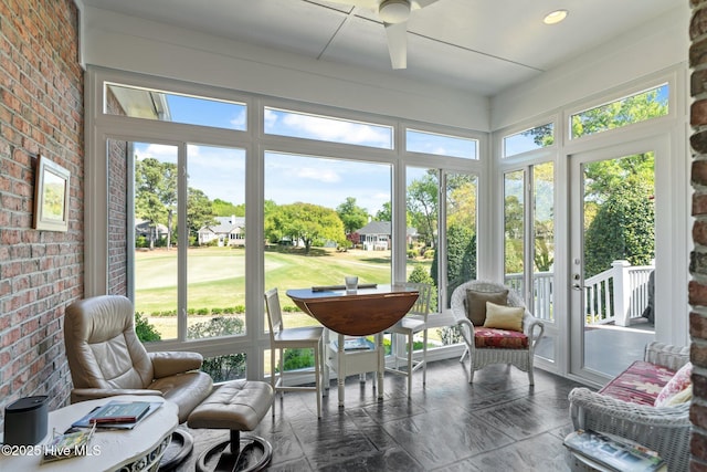 423 Black Diamond Dr, Wilmington, NC 28411 - sunroom / solarium featuring view of golf course and ceiling fan