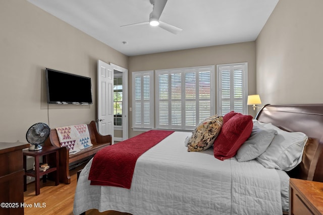 423 Black Diamond Dr, Wilmington, NC 28411 - bedroom with multiple windows, wood finished floors, and a ceiling fan