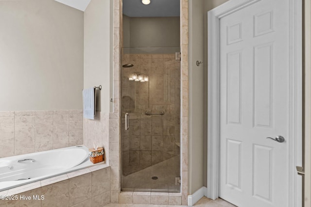 423 Black Diamond Dr, Wilmington, NC 28411 - full bath with a stall shower, a garden tub, and tile patterned flooring