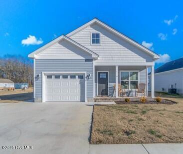 119 Bridgetowne Ave, Edenton, NC 27932 - view of front facade with concrete driveway, a porch, and an attached garage