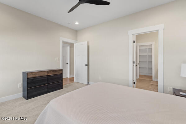 119 Bridgetowne Ave, Edenton, NC 27932 - carpeted bedroom featuring a spacious closet, recessed lighting, baseboards, and a ceiling fan