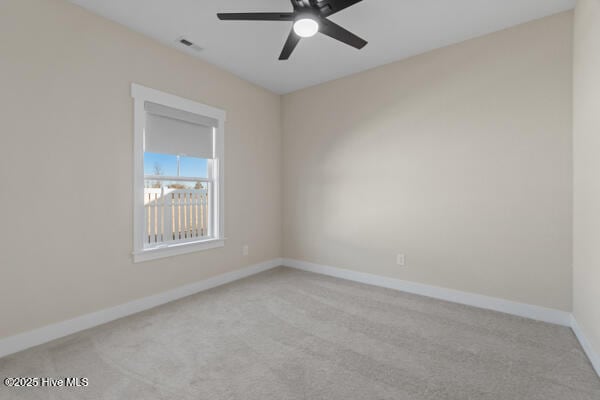 119 Bridgetowne Ave, Edenton, NC 27932 - spare room with a ceiling fan, carpet floors, and baseboards
