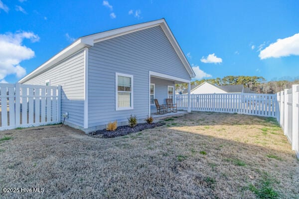 119 Bridgetowne Ave, Edenton, NC 27932 - view of property exterior featuring a fenced backyard and a lawn