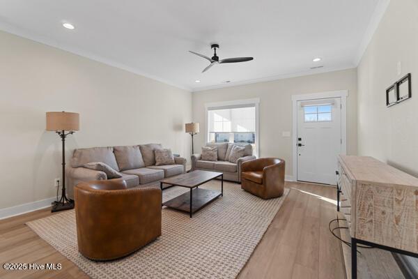 119 Bridgetowne Ave, Edenton, NC 27932 - living area with baseboards, light wood-type flooring, ornamental molding, recessed lighting, and a ceiling fan