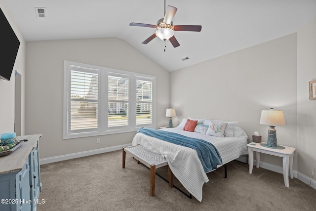 bedroom with baseboards, lofted ceiling, and visible vents