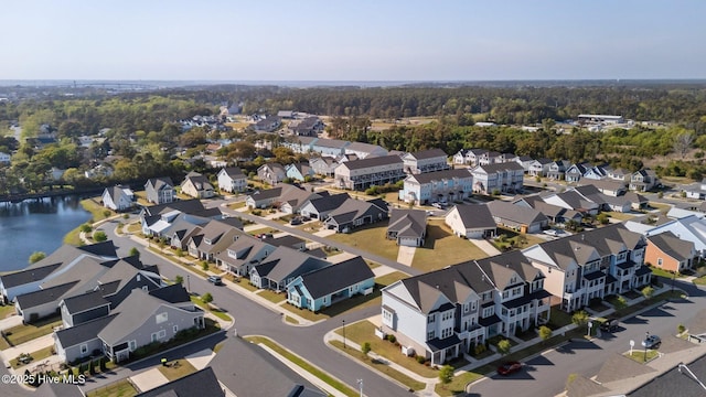 aerial view featuring a residential view and a water view
