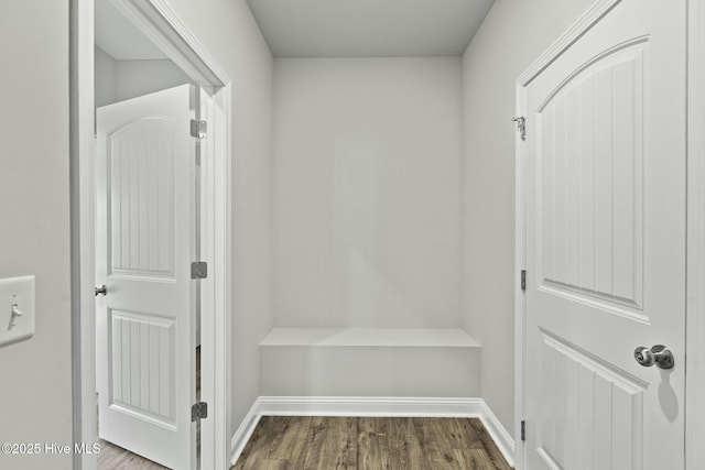 mudroom with baseboards and dark wood finished floors