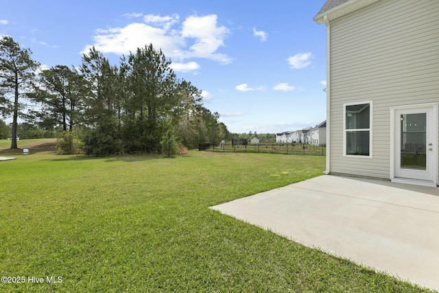 view of yard with a patio area and fence