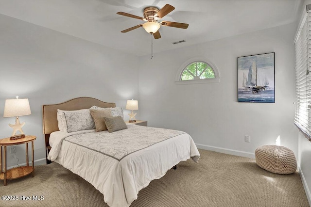 1957 Prestwick Ln, Wilmington, NC 28405 - bedroom with carpet floors, baseboards, and ceiling fan