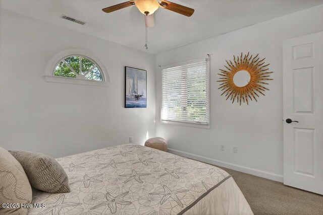 1957 Prestwick Ln, Wilmington, NC 28405 - carpeted bedroom featuring baseboards and ceiling fan